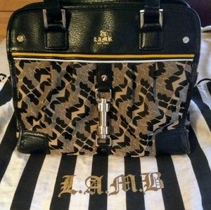 L. A. M. B. Black and tan commodore